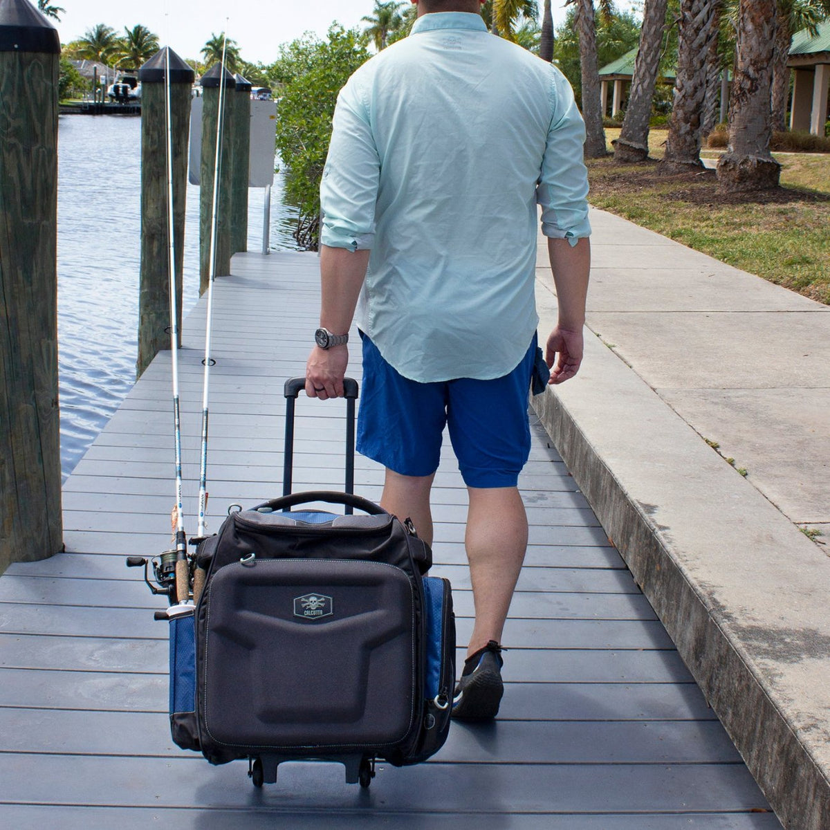 Calcutta Explorer rolling tackle bag on dock